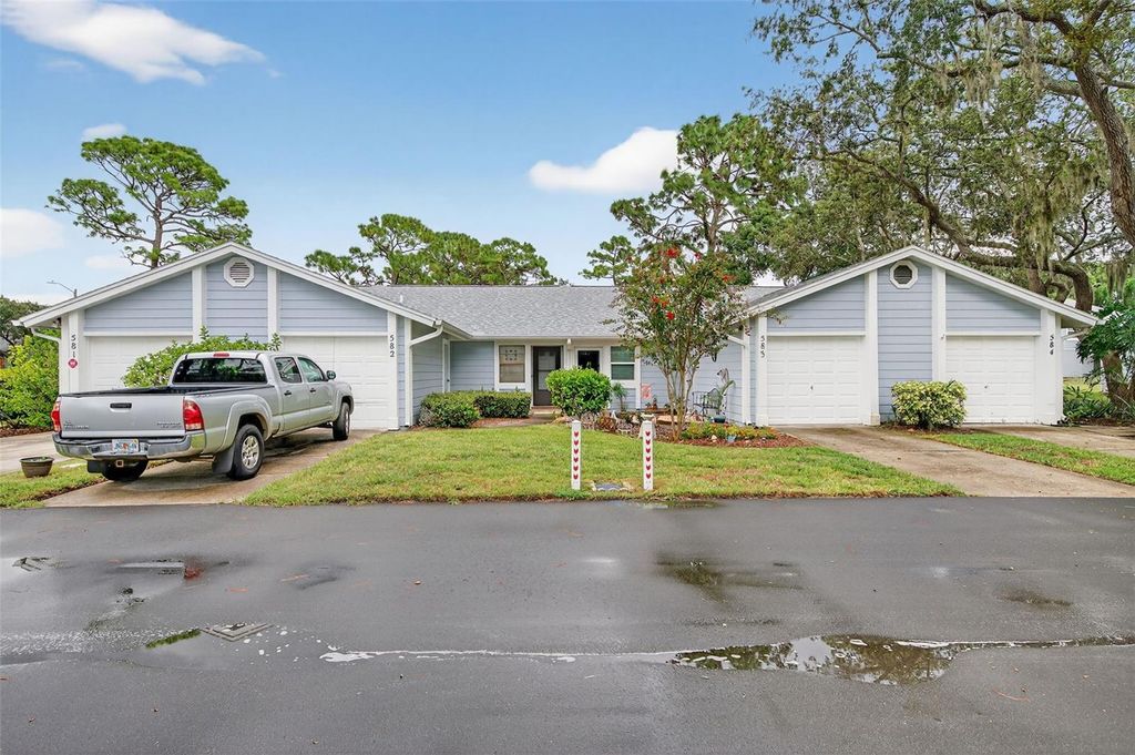 Photo of 39650 Us Highway 19 N #584, Tarpon Springs, FL 34689 (MLS # TB8414706)