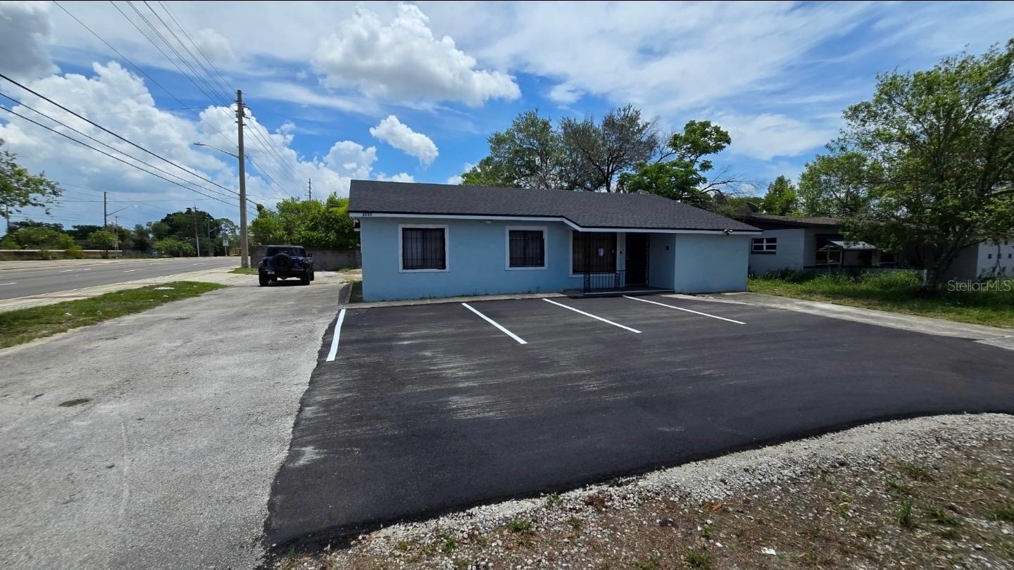 Take a look at this beautifully furnished and remodeled office building on busy Silver Star Road across from the gates of Evans High School. Conference room and 5 private offices, 2 restrooms, large reception area and full kitchen. Plenty of parking in front and back of the building. All new updates including wood tile floors and carpet, paint, fixtures, and more. The kitchen has separate entrance that can be used for private access. Security system already installed. Perfect building for professional office, medical, daycare, and more. LYNX bus stop is conveniently located right outside the property. Walk right outside to public transportation.
