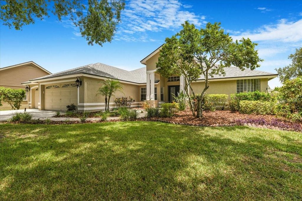 Photo of 816 Sandringham Lane, Lutz, FL 33549 (MLS # TB8406224)