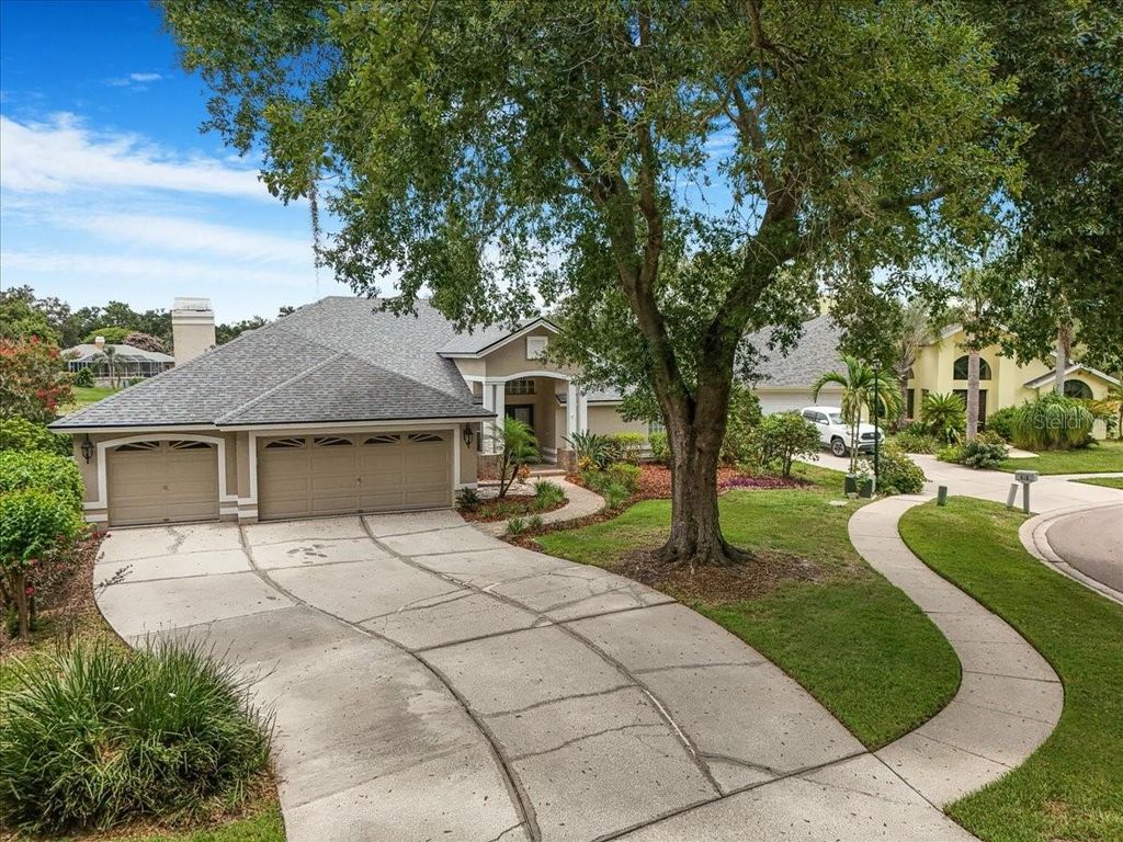 Photo of 816 Sandringham Lane, Lutz, FL 33549 (MLS # TB8406224)