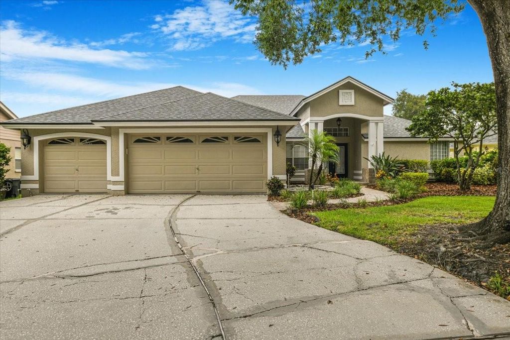 Photo of 816 Sandringham Lane, Lutz, FL 33549 (MLS # TB8406224)