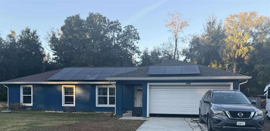 Beautiful 2018 - 4 bedroom, 2 bath, 2 car garage home sitting on .3 acres in Belleview, Florida. Hardwood floors throughout entire home, solar panels, hot tub and large climate controlled Florida room. Perfectly situated in central Florida just south of Ocala and north of The Villages. Come see for yourself how great this home truly is.