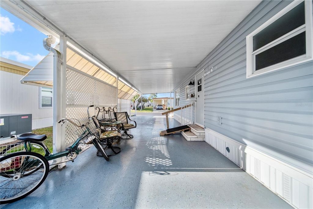 Photo of 10442 Gazebo Drive, Largo, FL 33773 (MLS # TB8432318)