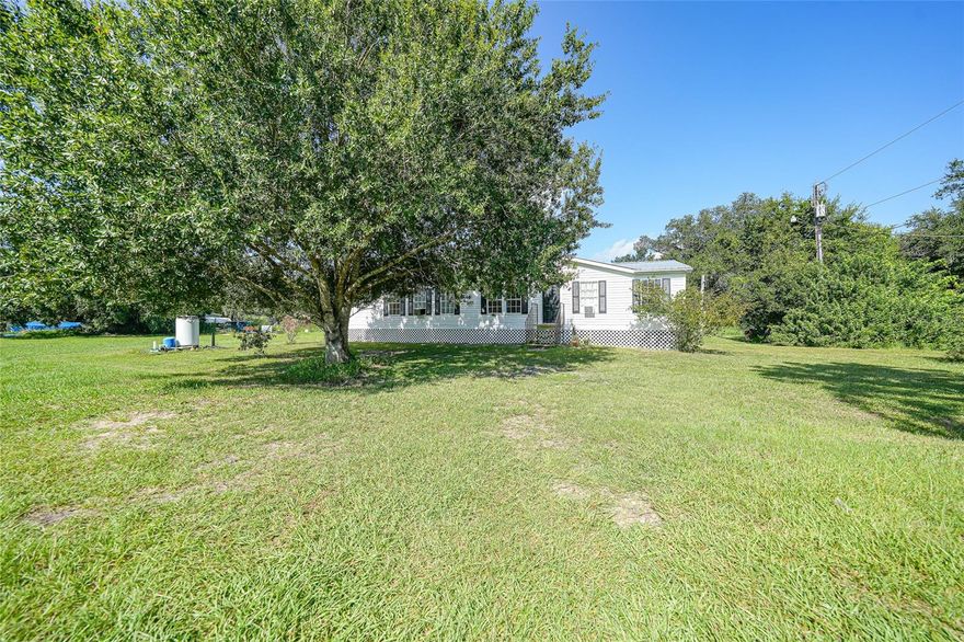 THIS HOME IS VA ELIGIBLE! Spacious 3-bedroom, 2-bathroom home offering 1,620 sq ft of living space on a .44-acre lot in Arcadia. Enjoy the freedom of NO HOA and NO lot rent, with plenty of room for parking, work vehicles, pets, or outdoor entertaining. This home features a split-bedroom floor plan, large living area, roomy kitchen with ample cabinet space, and a private primary suite with ensuite bath. The open yard offers endless potential for gardening, storage, or simply enjoying your space. One of the best values for a 3/2 on land in Arcadia. Don't miss this opportunity!