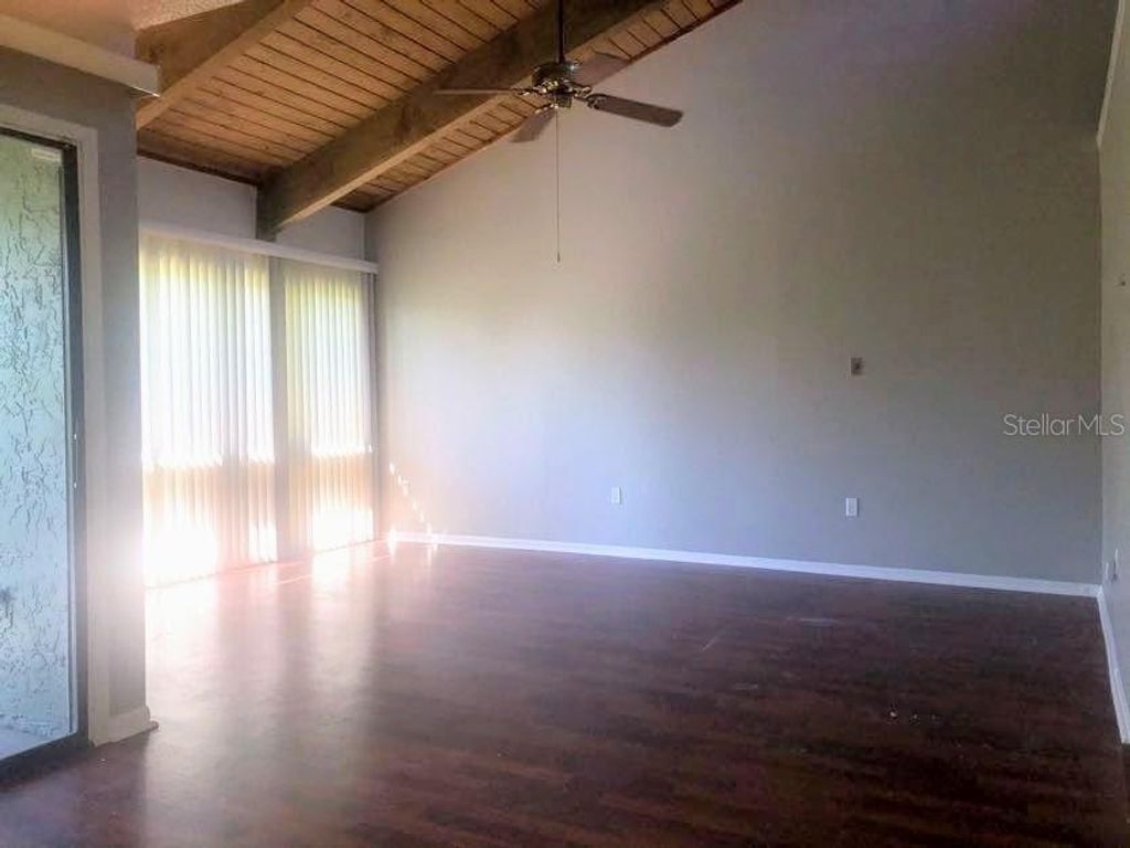 Photo of 5942 Peregrine Avenue #22C, Orlando, FL 32819 (MLS # O6393927)