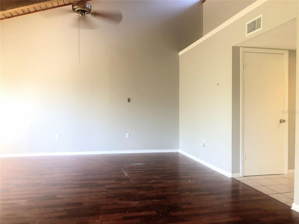 Photo of 5942 Peregrine Avenue #22C, Orlando, FL 32819 (MLS # O6393927)