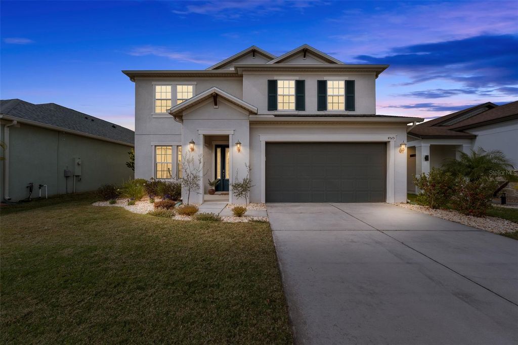 Photo of 4515 Rolling Green Drive, Wesley Chapel, FL 33543 (MLS # TB8465756)