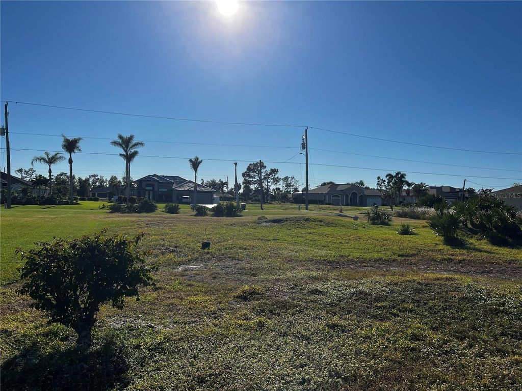 Photo of 671 Boundary Boulevard, Rotonda West, FL 33947 (MLS # C7501090)