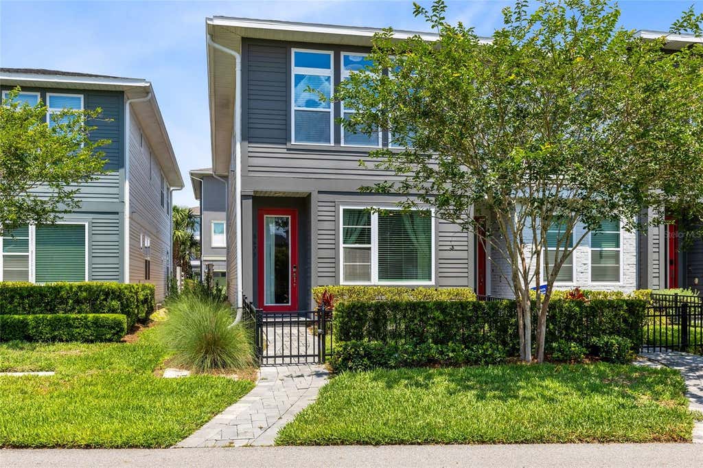 Photo of 8673 Tavistock Lakes Boulevard, Orlando, FL 32827 (MLS # O6412594)