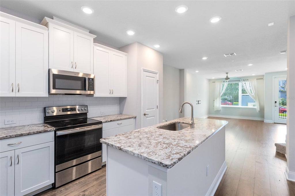 Photo of 8673 Tavistock Lakes Boulevard, Orlando, FL 32827 (MLS # O6412594)