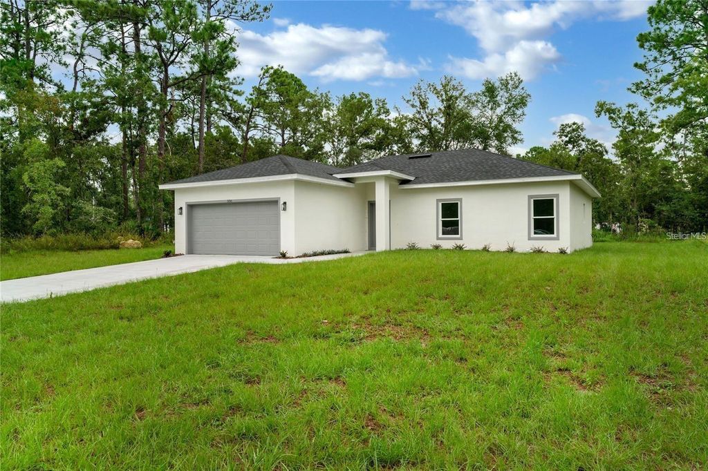 Photo of 556 Marion Oaks Pass, Ocala, FL 34473 (MLS # O6383382)