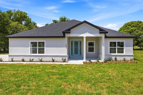 Photo of 464 N Cherry Pop Drive, Inverness, FL 34453 (MLS # OM723990)