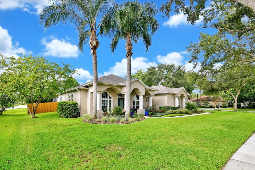 One or more photo(s) has been virtually staged. ***PRICE IMPROVEMENT & FRESHLY COATED POOL DECK***
Welcome to 4132 Bell Tower Court, a beautifully maintained 4-bedroom, 2-bathroom pool home located in one of the most desirable gated communities in Belle Isle, Florida. Situated on a quiet cul-de-sac and positioned on one of the largest corner lots in the neighborhood, this move-in-ready residence offers privacy, space, and exceptional upgrades throughout.

The property features lush, professionally landscaped grounds with an irrigation system connected to a private deep freshwater well, an extended driveway, three-car garage, wraparound walkway, and a welcoming front porch—perfect for enjoying morning coffee or evening relaxation.

Inside, the home offers a thoughtful split-bedroom floor plan with a formal dining room, separate reading/sitting area, a versatile front bedroom ideal for a home office or guest suite, and dual zone A/C unit for each side of the house. The spacious primary suite is privately located at the rear of the home and includes abundant natural light, a large walk-in closet, and peaceful pool views. The ensuite bathroom features a garden tub, separate shower, dual-sink vanity, private water closet, and ample linen storage.

The updated kitchen showcases quartz countertops, tall wood cabinetry, stainless steel appliances, and breakfast bar seating. The kitchen opens to the family room with a wood-burning fireplace and sliding glass doors overlooking the patio and pool.

An enclosed, air-conditioned Florida room provides year-round indoor/outdoor living—perfect for entertaining or relaxing. Two additional bedrooms and a full bathroom are located on the opposite side of the home, with convenient pool access for guests.

The fully fenced backyard is an entertainer’s dream, featuring a solar- or gas-heated swimming pool, built-in heated spa, large grassy lawn, storage shed, and serene pond views. Enjoy Florida sunsets, weekend cookouts, and complete peace of mind with a recently installed whole-house generator—you’ll never lose power.

Located in the desirable Conway Isles community, residents enjoy access to a park, playground, gazebo, volleyball court, and proximity to the Lake Conway Chain of Lakes. Conveniently close to A-rated schools, shopping, dining, Orlando International Airport, downtown Orlando, theme parks, and major highways.

This home offers the perfect combination of location, luxury, upgrades, and lifestyle.

Recent Upgrades & Improvements:

Freshly coated pool deck area (Feb. 2026)

New LED pool and spa lights (Nov. 2024)

Pentair wireless pool/spa/light control panel (Nov. 2024)

Tankless water heater (Nov. 2024)

200-amp electrical panel (Nov. 2024)

Honeywell 22kW whole-house generator with transfer switch – permitted (June 2025)

Closet converted to coffee bar/kitchen station (Dec. 2024)

Living room and primary bedroom switches + whole-house vent replacements

Two 220V EV charging outlets in garage

New refrigerator (June 2025)

Interior home fully painted (Nov. 2024)

Three flood lights, doorbell, door handles, and living room fan replaced (June 2025)

Double-bay garage door service and new opener (Feb. 2025)