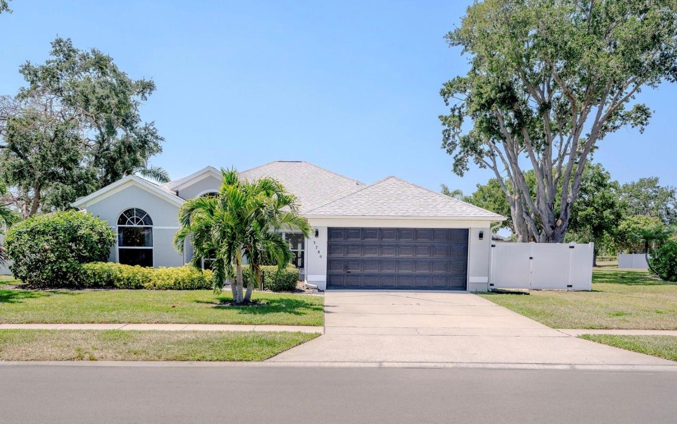 **Seller Motivated!** Welcome to Sunset Lakes and your renovated 4 bedroom home. A beautiful and modern kitchen with brand new appliances and granite counters and seating at the island awaits you. Enjoy the privacy of one of the largest yards in the neighborhood! This home is complete with renovated bathrooms and a brand new dedicated office making this a MUST SEE. Nothing left to do but move in and enjoy the neighborhood amenities including a secure gated entrance. You will enjoy the back screened porch with your brand new fence and start or end your day there. Sunset Lakes is close to restaurants and shopping yet private with a lot of green space. Come take a look before it's gone!