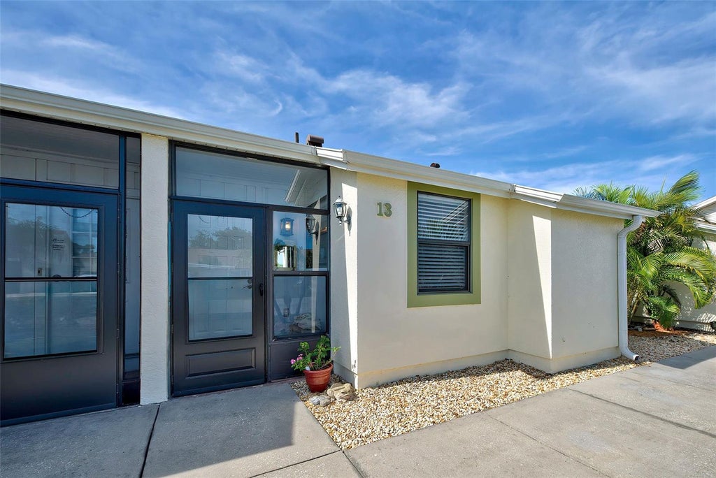 Photo of 6796 Gasparilla Pines Boulevard #13, Englewood, FL 34224 (MLS # N6146152)