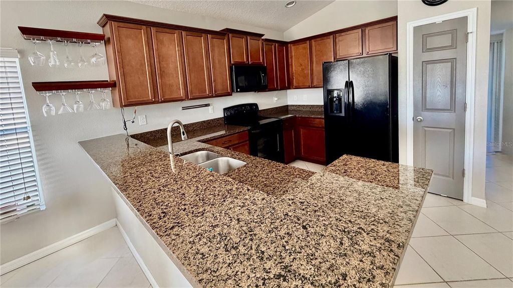 Photo of 3416 Mallard Pond Boulevard, Saint Cloud, FL 34772 (MLS # TB8489346)