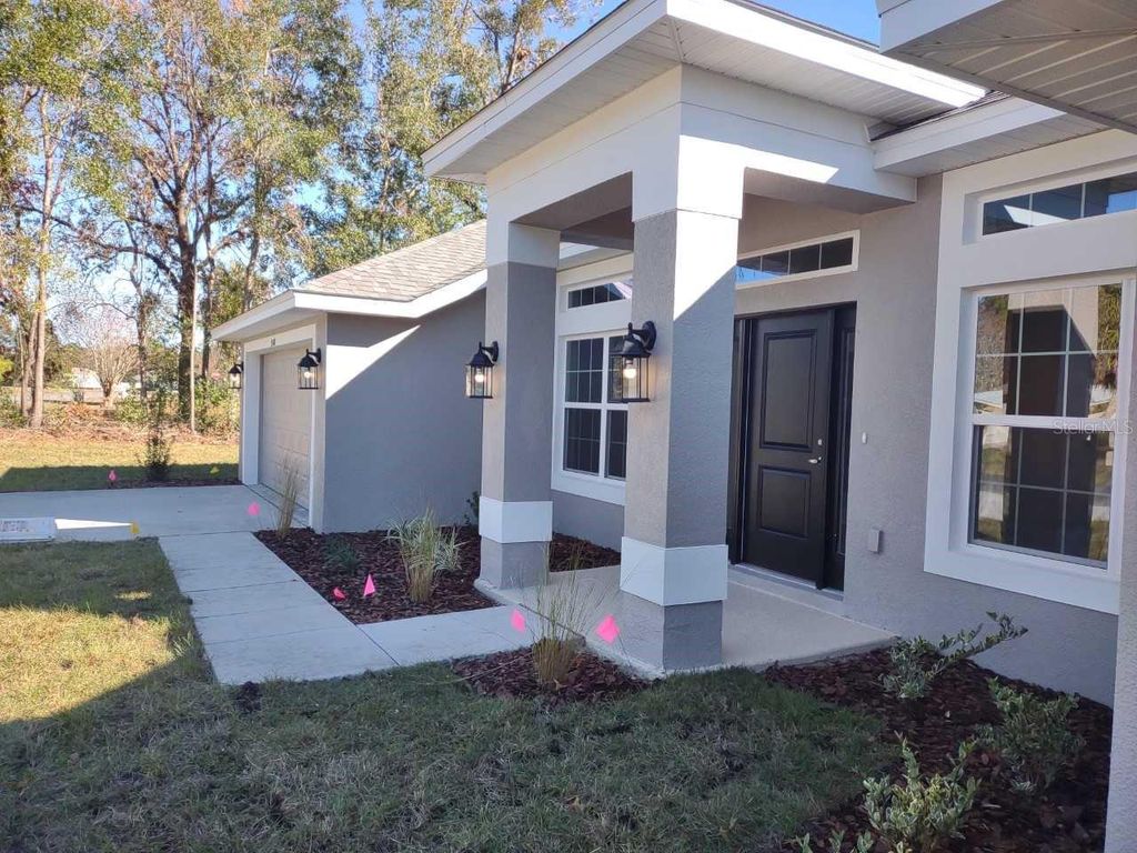 Photo of 1772 SW 168th Loop, Ocala, FL 34473 (MLS # OM723074)