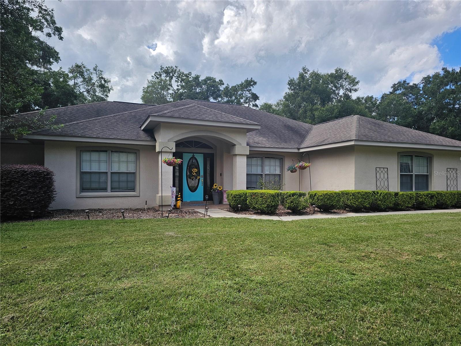 Contemporary Pool Home with Exceptional Outdoor Living
Discover the perfect blend of indoor comfort and outdoor luxury in this three-bedroom, two-bath home with a bright open floor plan. At the heart of the home is a spacious kitchen featuring rich wood cabinetry, granite countertops, and a welcoming breakfast nook, complemented by a separate formal dining room and a versatile bonus room ideal for a study or home office.
The true showpiece is the backyard retreat: a sparkling screen-enclosed pool surrounded by an expansive brick-paver deck and a large covered patio—perfect for entertaining, relaxing, or enjoying sunny afternoons year-round.
Practical touches abound, including an inside laundry room with washer and dryer and a large additional storage room inside the two-car garage, providing plenty of space to keep everything organized. The private owner’s suite offers a garden tub, dual vanities, and his-and-hers walk-in closets, while plantation shutters throughout add timeless elegance and energy efficiency.
This move-in ready property is designed for seamless indoor-outdoor living and unforgettable gatherings.