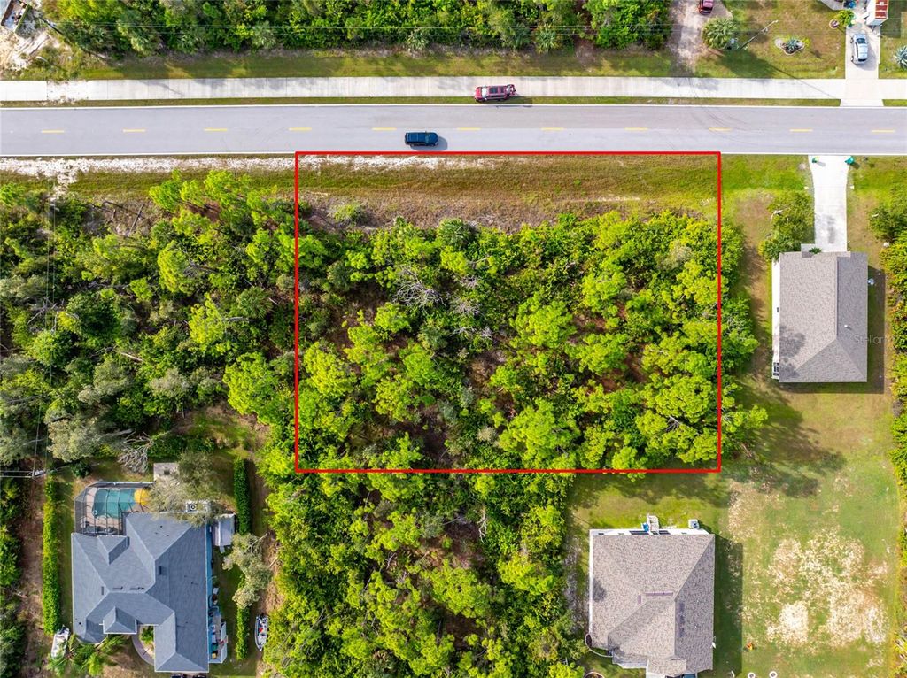 Photo of 9412 Hallendale Drive, Port Charlotte, FL 33981 (MLS # D6144679)