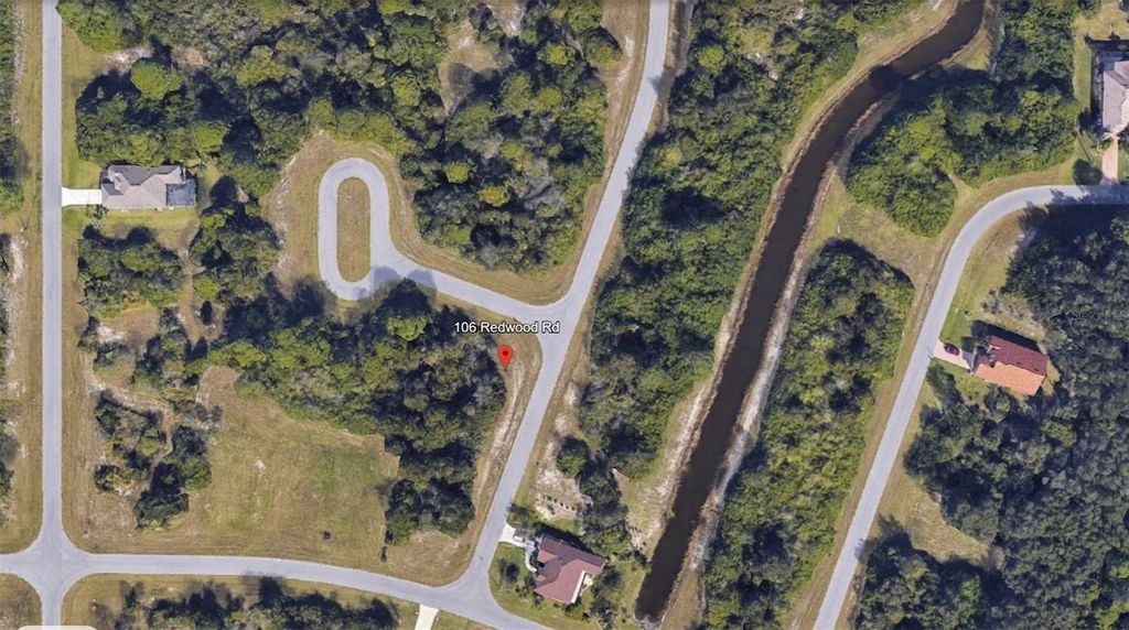 Photo of 106 Redwood Road, Rotonda West, FL 33947 (MLS # A4641717)