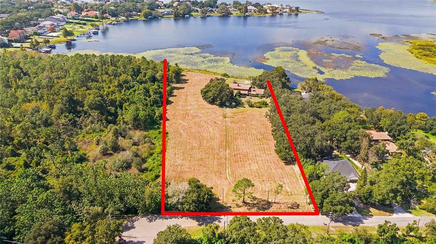Exceptional DEVELOPMENT OPPORTUNITY, currently R-CE zoning should allow for 3 Lakefront Luxury Home Sites Discover over 5+acres of waterfront land with 300 feet of pristine shoreline on LAKE DOWN, part of the coveted BUTLER CHAIN of Lakes. This is a rare chance to create a premier LAKEFRONT ESTATE or subdivide to create three ideally sized lots with WATER FRONTAGE. At present, the property includes an older 5,000 sq ft home (5 bedrooms, 3.1 baths) and an oversized four car garage, which can serve as a temporary residence or teardown to make way for your vision. Why this property stands out, Unmatched location: Situated on the east side of Windermere, with convenient access from Conroy Windermere Road and Apopka Vineland. Windermere prestige, Offers the cachet of a WINDERMERE ADDRESS and proximity to luxury amenities. Prime access: Minutes to Isleworth Country Club, Bay Hill, and downtown Windermere. Development upside: Ready canvas for luxury estates in one of Central Florida’s most desirable waterfront corridors. Whether you’re a developer, custom builder, or investor, this is your opportunity explore and deliver truly exceptional homes in a highly sought-after market. Property is also listed as residential MLS # O6355233