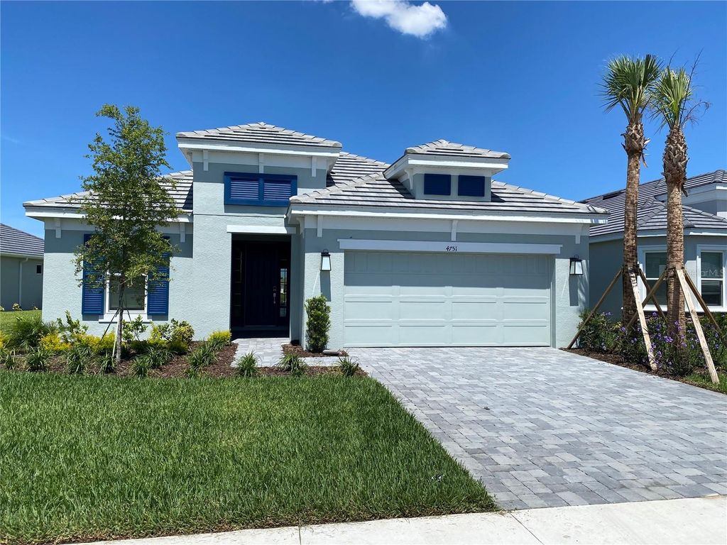 Photo of 4751 Isonzo Way, Wesley Chapel, FL 33543 (MLS # J990236)