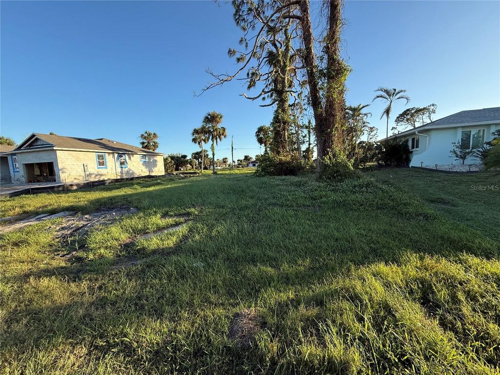 Photo of 57 Mark Twain Ln, Rotonda West, FL 33947 (MLS # D6139199)