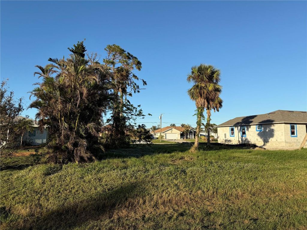 Photo of 57 Mark Twain Ln, Rotonda West, FL 33947 (MLS # D6139199)
