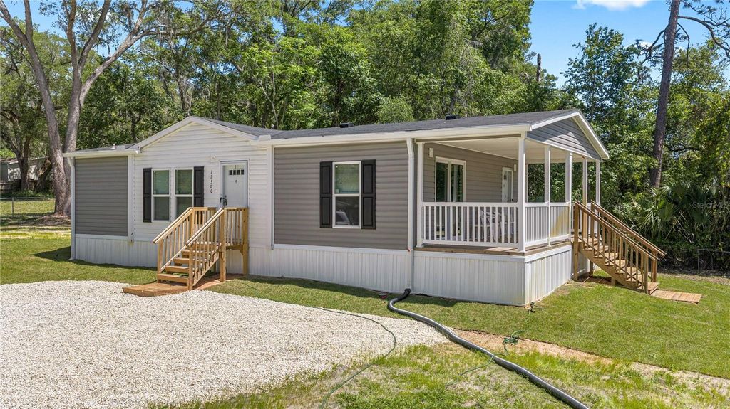 Photo of 17360 SE 65th Street, Ocklawaha, FL 32179 (MLS # OM722979)