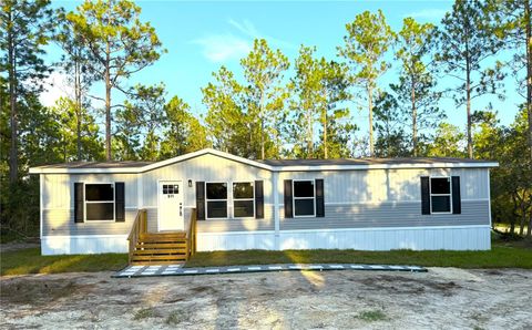 Photo of 611 NE 130 Avenue NE, Williston, FL 32696 (MLS # A4643988)
