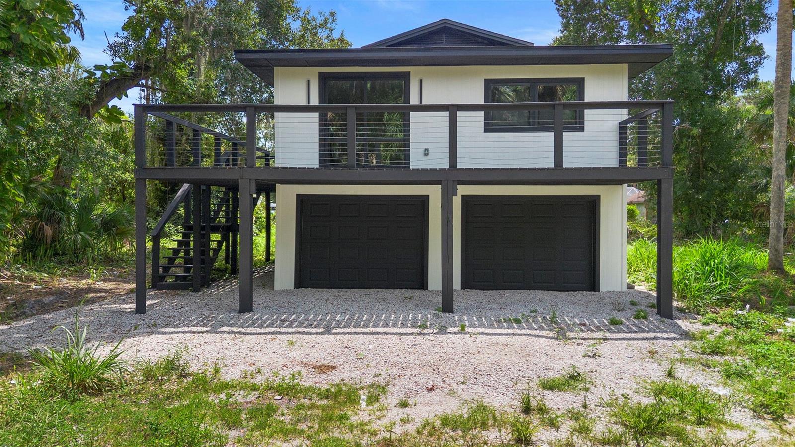 Welcome to 4165 Peppertree St—a beautifully updated gem nestled just minutes from the beach. This spacious home offers modern coastal living with a smart open-concept design. The main level features a two-car garage. The second level leads into a bright and airy living room that flows effortlessly into a designer kitchen, complete with granite countertops, a large center island, and stainless steel appliances—perfect for entertaining.
On the opposite wing, you'll find the private sleeping quarters, including a serene primary suite with a walk-in closet and a sleek, updated bathroom. Two additional bedrooms share a stylish full bath, ideal for family or guests.
Situated on over an acre of land, enjoy the freedom and space rarely found this close to the coast. Whether you're hosting backyard gatherings, dreaming of a garden, or looking to build more—this property has the room for it all.
Just minutes from top attractions! You're close to Cocoa Beach for surfing and sun, Historic Cocoa Village for shopping and dining, and Port Canaveral for waterfront restaurants and cruise views. Outdoor lovers will appreciate nearby parks, kayaking on the Banana River, and quick access to the Kennedy Space Center and Brevard Zoo for family fun.
Don’t miss your chance to own this modern retreat in a prime Cocoa location!