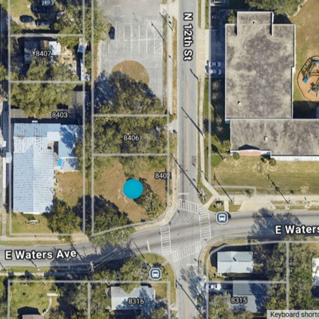 Photo of Corner Of E Waters Ave And N 12th Street, Tampa, FL 33606 (MLS # TB8465821)