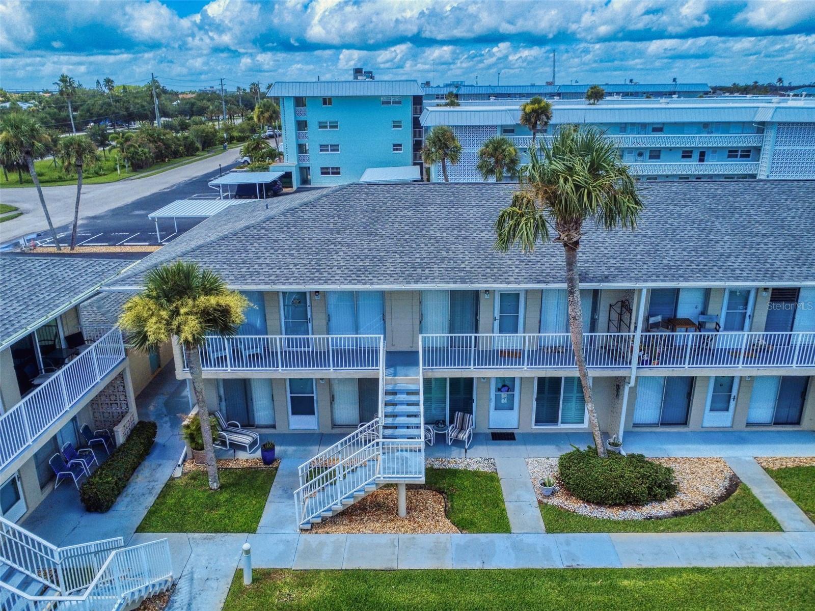 Embrace the essence of paradise and the relaxed pace of island living with this exquisite unit. Nestled conveniently between the vibrant Flagler Avenue, which offers beach access, and the charming Historic Canal Street, this property is perfectly situated. The locale is celebrated for its eclectic boutique shops and an array of dining options, ranging from upscale establishments to beloved local eateries.
This beautifully updated ground floor unit boasts artistic finishes and features one cozy bedroom and a well-appointed bathroom. Access to the unit is made easy with a covered carport at the back, providing shelter from the elements. Inside, you'll find elegant details such as coffered ceilings, brand new sliding doors, a luxurious clawfoot tub, classic wood shutters, charming bead board accents, and fresh doors and flooring throughout. Community amenities further enhance your living experience, including a glistening pool, docks, a fishing pier, shuffleboard courts, and boat slips for rent. Additional conveniences like laundry facilities and a lushly maintained courtyard create a welcoming atmosphere. Whether you choose to explore the area by golf cart or boat, this is an ideal haven to call home, whether for full-time living, part-time escapes, or spontaneous getaways. Don’t miss out—call today to schedule your private showing and embark on the next exciting chapter of your life!!!