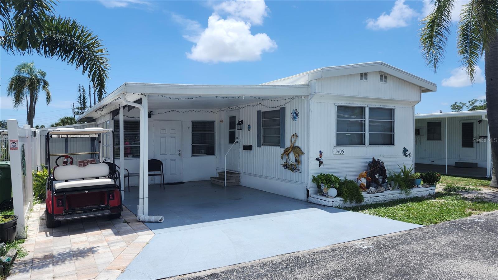 Charming Fully Renovated 1-Bedroom Home in Bradenton Tropical Palms
This beautifully updated 1-bedroom, 1-bath home offers ample living space, perfect for full-time residents or snowbirds looking for a comfortable and convenient retreat. Completely redone with new drywall and flooring throughout, this home exudes modern charm and functionality.
Enjoy a cozy, finished lanai with new insulation, providing extra space to relax or entertain. The new roof (2024) with a transferable warranty and a tankless water heater (2024) ensure peace of mind for years to come.
The kitchen is a true highlight, featuring custom-designed backsplash and a Rachel Ray Island, complemented by modern appliances and a convenient dishwasher.
Step outside to the extended carport, providing additional space for outdoor seating or enjoying Florida's beautiful weather. A large 5x8 shed offers plenty of room for all your storage needs.
Sold fully furnished, this home is move-in ready, making it an excellent choice for those looking for a hassle-free home in a vibrant community.
Located in the 5-star Bradenton Tropical Palms park, you’ll be close to shopping, dining, and entertainment, including the Pittsburgh Pirates Spring Training facility. Just 6 miles from the beautiful beaches of Anna Maria Island, this location offers the perfect mix of relaxation and convenience.
Don’t miss out on this must-see property—schedule a tour today!
