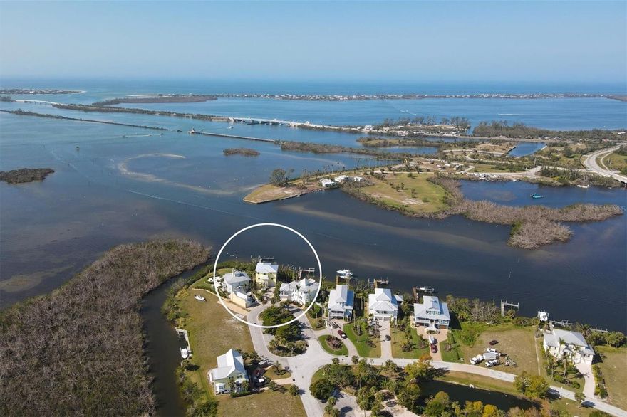 4 Bed 3 ½ Bath Waterfront Home with Dock and 20,000 Lb Lift! Built in 2016 this custom home boasts an elevator, impact windows, a new metal roof, hardie board siding and new hardie board soffits! Located on The Point at the Anglers Club, the lanais offer panoramic water views of Gasparilla Sound and the ICW that can’t be surpassed! The first living level has 3 bedrooms, 2 bathrooms, and a den with a large lanai. The upper floor includes the master suite, kitchen, living and dining room, half bath and another large lanai with sunset views! The large 4 car garage offers ample storage for all your toys and elevator access to all levels!  Fish off the dock, enjoy your kayak or SUP with your very own kayak launch, or lower your boat in for some of the best boating and fishing Florida has to offer! The Anglers Club gated community offers a community pool and a 800Ft community dock. Located adjacent to Gasparilla Marina with a ships store, fuel, repairs, and supplies. Restaurants, the 7-mile Pioneer Trail, shopping and beaches are only miles away!