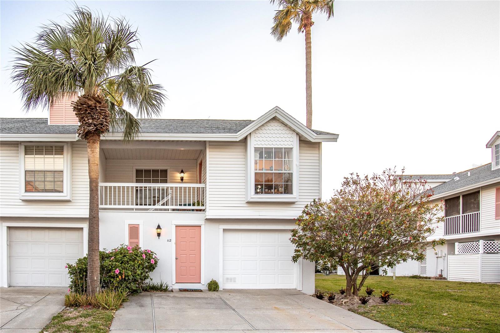Spacious 2BR/2BA End-Unit Condo with Vaulted Ceilings, Pond View & Garage – Steps from Treasure Island Beach!
This is your rare opportunity to own one of the largest and most desirable end-units in a well-maintained, tropical community just minutes from Treasure Island Beach. This elevated 2-bedroom, 2-bath home features a bright, open floor plan with vaulted ceilings and bamboo flooring throughout the main second-floor living space. A large designer window and sliding glass doors fill the home with natural light and open to a screened-in porch overlooking a tranquil pond.
The layout includes a spacious living and dining area, an open kitchen, and a primary suite with en-suite bath and ample closet space. Additional highlights include Pelican Water Purification System throughout the home, in-unit laundry and attached garage with room for two cars, two workspaces, and a ground-level covered porch. The heated community pool is just steps from your backyard.
Perfectly located near John’s Pass, enjoy easy access to dining, shopping, entertainment, and Roselli Park, which features tennis and pickleball courts, a baseball field, dog park, and playground. Hop on the Central Ave Trolley to explore Downtown St. Pete, or take a scenic ferry to Tampa’s Channelside. Only 30 minutes to St. Pete/Clearwater Airport and 45 minutes to Tampa International.
This home is ideal as a primary residence, seasonal retreat, or investment property, with short-term rentals allowed (30-day minimum, up to 6 times/year). The property is beautifully maintained.