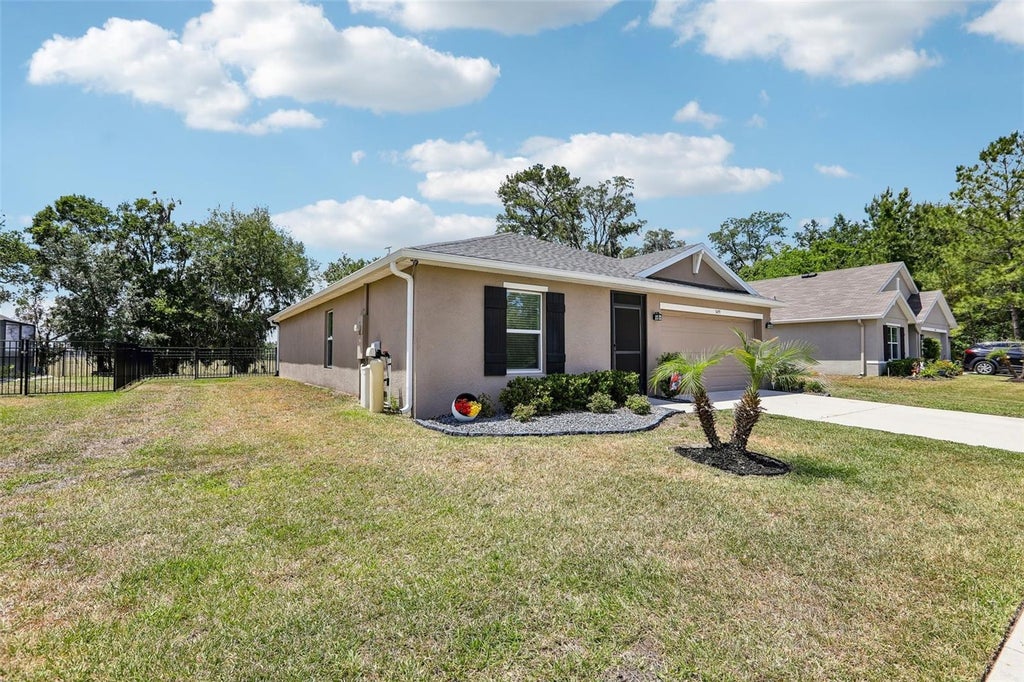 Photo of 5499 Diantha Way, Brooksville, FL 34604 (MLS # TB8503400)