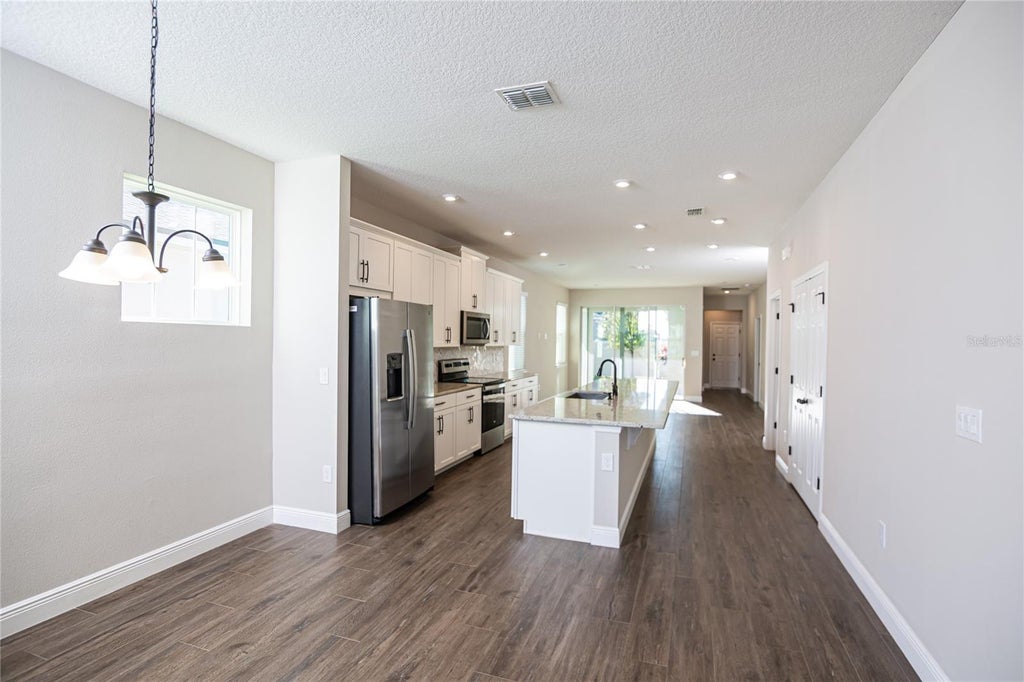 Photo of 16759 Olive Hill Drive, Winter Garden, FL 34787 (MLS # O6451621)