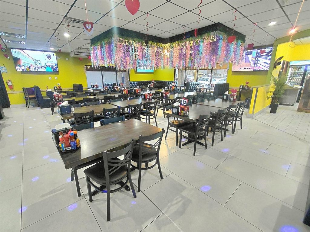 Photo of 909 W Vine Street, Kissimmee, FL 34741 (MLS # W7883011)