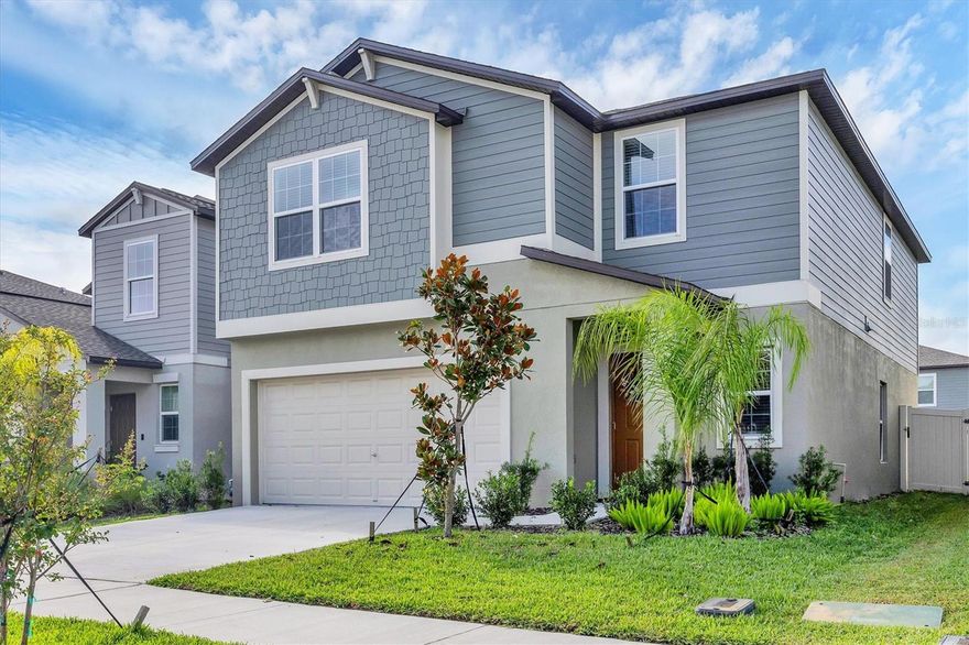 One or more photo(s) has been virtually staged. Welcome to your dream home! This spacious two-story home featuring 5 bedrooms and 2.5 baths is perfectly designed for comfort and modern elegance. Step inside to an inviting layout with ceramic tile flooring throughout the main living areas, kitchen, and bathrooms, offering both durability and style. As the heart of the home, the kitchen showcases sleek quartz countertops, abundant cabinetry, gas range, and stainless steel appliances. The kitchen’s open flow concept makes it ideal for entertaining or family gatherings. Each bathroom also features elegant quartz finishes, adding a touch of luxury to your everyday routine. Upstairs, you’ll find generously sized bedrooms providing space for everyone to unwind. Additionally, the upstairs offers a bonus loft serving as a flexible space perfect for a media room, playroom or home office. Step outside to a private fenced backyard, ideal for pets, play, or relaxing evenings outdoors. Located in Connerton, a master-planned community with exceptional amenities, playground, pools, parks, dog parks, trails and top-rated schools. This picture-perfect home embodies modern style, functionality and style— the perfect setting for your next chapter! One or more photo(s) has been virtually staged. MOVE-IN READY!