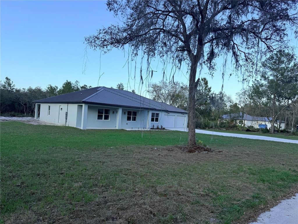 Photo of 1623 Magnolia Avenue, Deland, FL 32724 (MLS # V4947837)