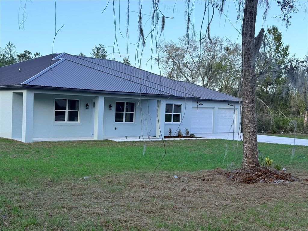 Photo of 1623 Magnolia Avenue, Deland, FL 32724 (MLS # V4947837)