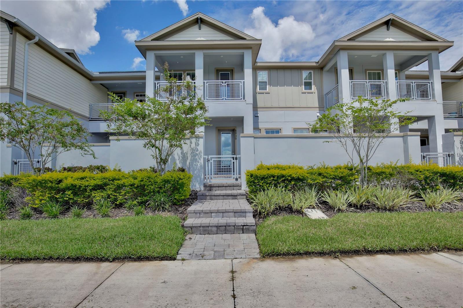 Stunning 3/2.5 Modern Townhome with a Private Courtyard and a Spacious 2 Car Garage in the Desirable Laureate Park Community in Lake Nona - Orlando! Available Now! Fiber-optic speed internet and full service lawn care included with the HOA.
This outstanding community offers residents resort-style amenities like an aquatic center with 2 pools (family pool & quiet pool), playground, multiple parks, fitness area, sand volleyball pit, Canvas Restaurant and Cafe, Lakehouse Event Venue and over 40 miles of walking and biking trails. You will always find an activity to entertain your family and guests. As you walk through the paved courtyard and enter this stunning townhome, you will be impressed with modern upgrades and stylish floor plan. The open concept allows plenty of natural light to brighten this home, providing a relaxed and welcoming atmosphere. Beautiful tile flooring flows throughout the main living areas and hardwood stairs that lead to the second level with cozy carpet flooring in all the bedrooms. The heart of this home is the gorgeous kitchen, boasting quartz countertops with 42" cabinets, kitchen backsplash, a kitchen island/breakfast bar and modern stainless steel appliances. The kitchen overlooks the living room and dining room area, perfect for entertaining. On the first floor you will also find a convenient half bathroom. Upstairs the layout offers privacy for everyone with two spacious guest bedrooms, both with an ample closet and a stylish jack & jill bathroom for ease and comfort. The master suite is a true retreat featuring a generous walk-in closet and a luxurious ensuite bathroom boasting a large vanity mirror with a dual vanity sink and a glass step-in shower. Additionally, the master suite opens to the balcony, the view is nothing short of breathtaking, It's the perfect setting for a relaxing evening. All bathrooms' highlight upgraded cabinets and Silestone Level 3 quartz countertops. For added convenience, this home has a laundry room (Washer and Dryer Hook-ups only), plus a spacious 2 car garage. The functionality of this home is only outdone by the serenity of the outdoors. Don't miss it! Great location, just a short drive to Orlando International Airport. Close proximity to Lake Nona Medical City, Nemours Hospital, Nona Adventure Park, Lake Nona Country Club, Schools, shopping, restaurants and entertainment options with easy access to FL-417. Pets will be considered. All residents are enrolled in the Resident Benefits Package which includes AC filter delivery, utility concierge, our best-in-class resident rewards program, and much more! More details in our Rental Selection Criteria or upon application. NO SIGHT UNSEEN APPLICATIONS.