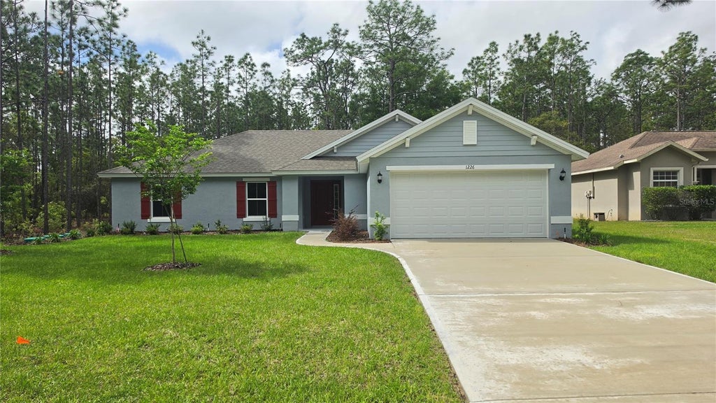 Photo of 1226 W Galgano Street, Citrus Springs, FL 34434 (MLS # OM730799)