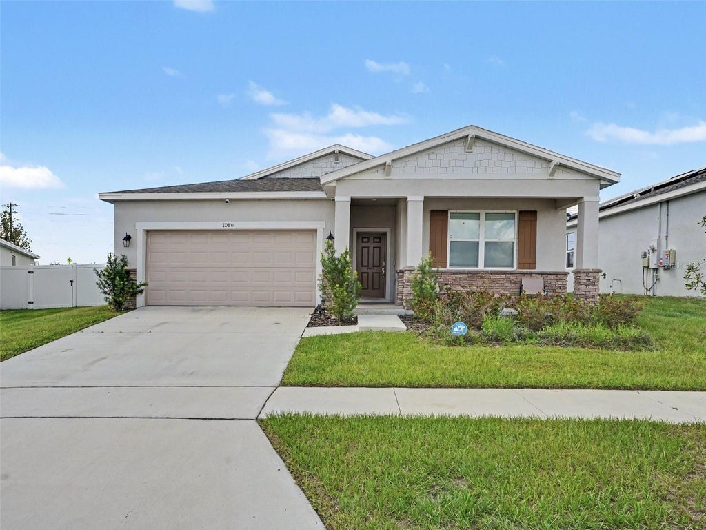 Photo of 1080 Patriot Loop, Haines City, FL 33844 (MLS # TB8549713)