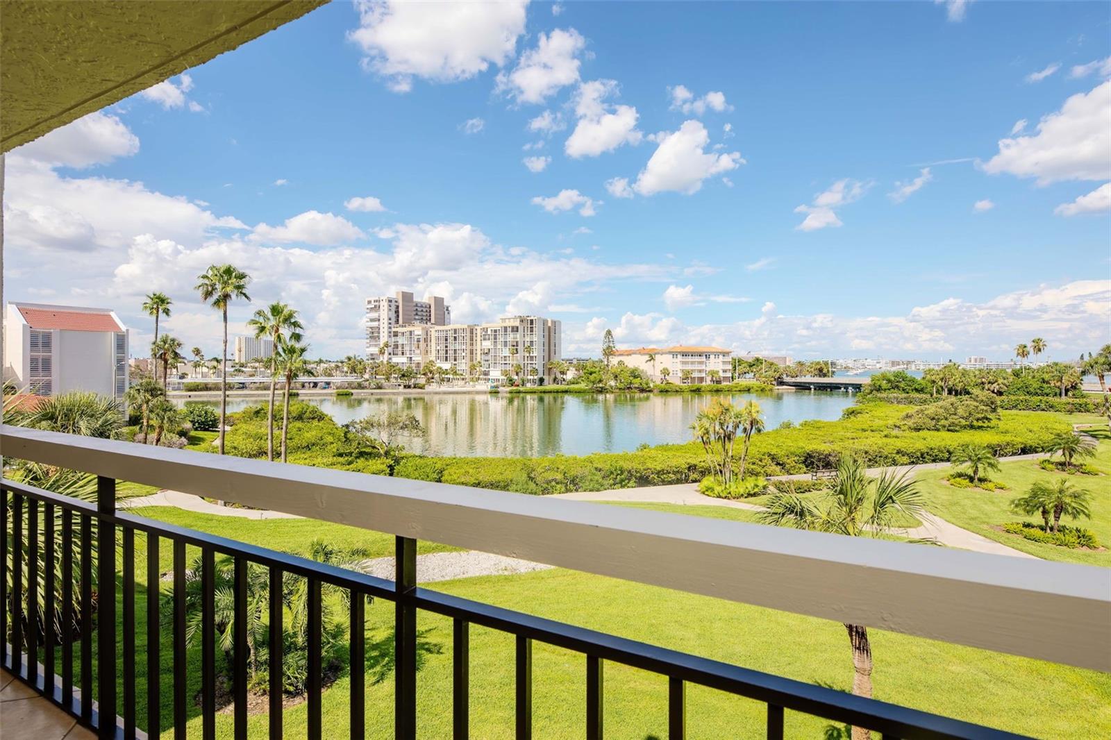 Welcome to Harbourside Condominiums! Island Living at Its Best! Unmatched Amenities & Endless Potential. This is your opportunity to own a spacious 2-bedroom, 2-bath condo just minutes from the shores of Saint Pete Beach! Harbourside is one of the area's most sought-after waterfront communities on Floridas Gulf Coast! Nestled on sun-kissed Boca Ciega Bay, this unit offers the best of coastal living with a full suite of resort-style amenities — including a heated pool, fitness center, sauna, hot tub, shuffle board, tennis & pickleball courts, clubhouse with library, woodworking shop, game rooms and a very active social calendar, boat docks, Kayak racks, EV charging stations & 3 car wash bay with vacuum, also enjoy the 1.5 mile scenic walking path around the island. Inside, the condo features a generous open floor plan, and a spacious private balcony with water views and bay breezes. This unit is ready for your personal touch — offering custom cabinetry, granite countertops and a classic layout that make it a perfect canvas for modern upgrades. Whether you're looking for a vacation escape, or a full-time residence this unit presents tremendous value in a secure, well-managed community with on-site management, 24-hour security, and covered parking.
Don't miss the chance to bring your vision to life in this prime coastal location — just minutes from shops, restaurants, and all the charm of the beach lifestyle. Owner is Motivated all reasonable offers considered!