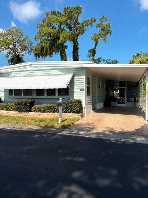 Photo of 130 Patricia Avenue #119, Dunedin, FL 34698 (MLS # TB8529105)