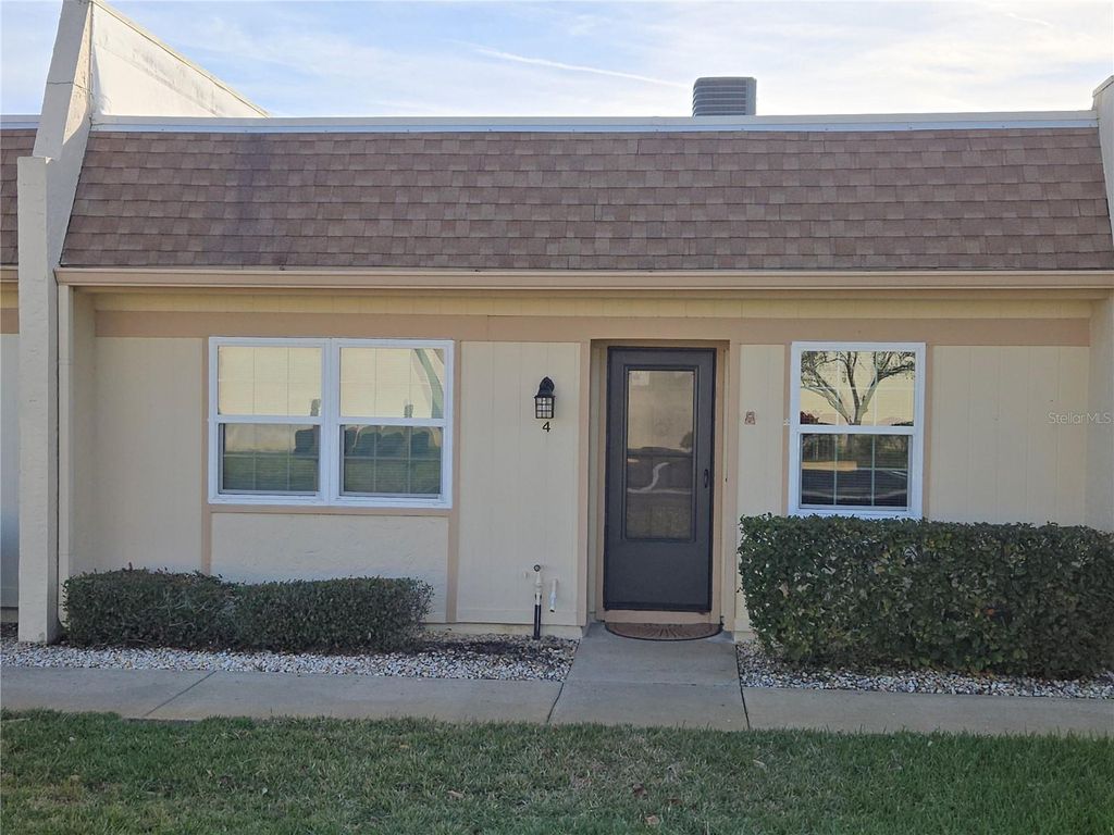 Photo of 11130 Carriage Hill Drive #4, Port Richey, FL 34668 (MLS # TB8463780)