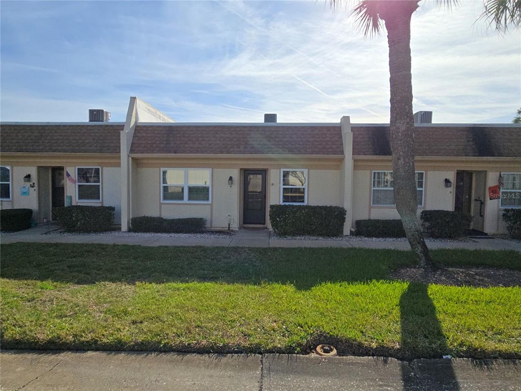 Photo of 11130 Carriage Hill Drive #4, Port Richey, FL 34668 (MLS # TB8463780)