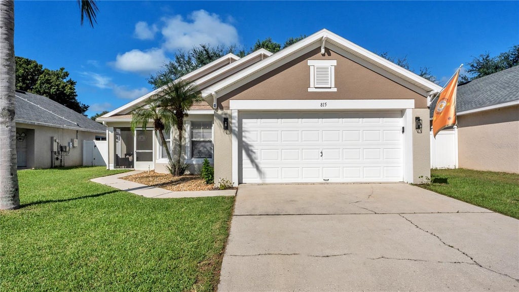 Photo of 815 Windsor Estates Dr, Davenport, FL 33837 (MLS # L4965295)